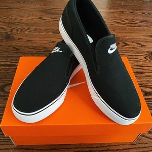 Womens Nike slip ons Size 9.5